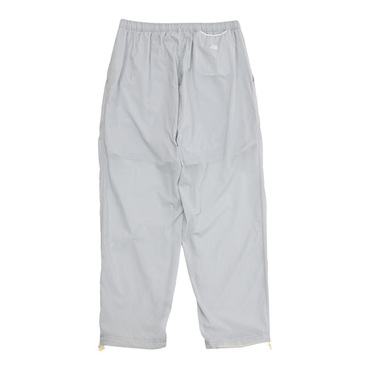 TOKYO DESIGN STUDIO New Balance - Wind Pants UP55100 - RCD